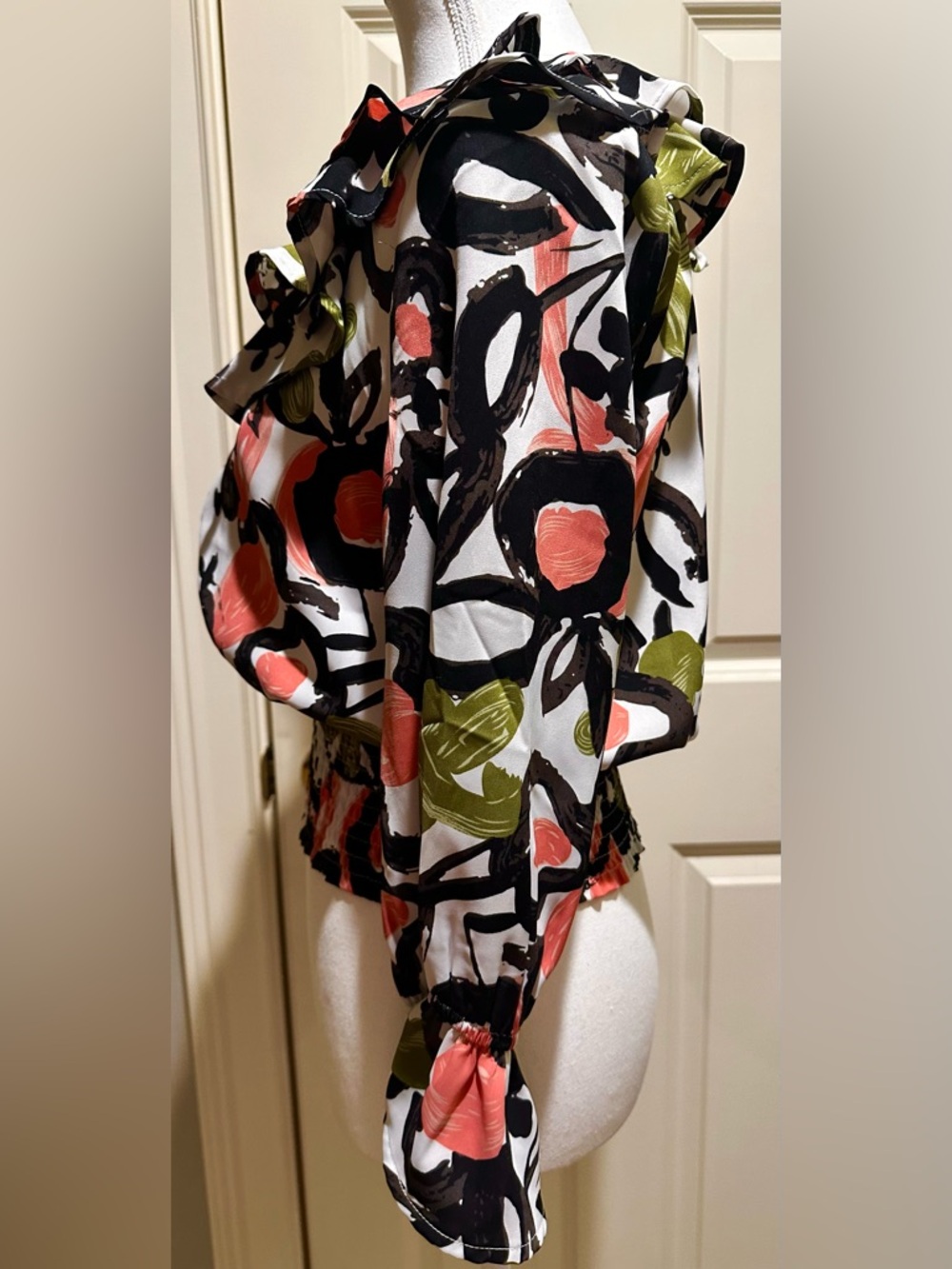 Gracia White Floral Zip-Front Ruffle Blouse with Coral, Black and Green Accents - Picture 6 of 9